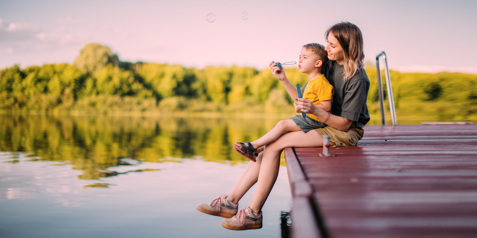 Biologica Spa Alchemy - happy mother and son on a jetty
