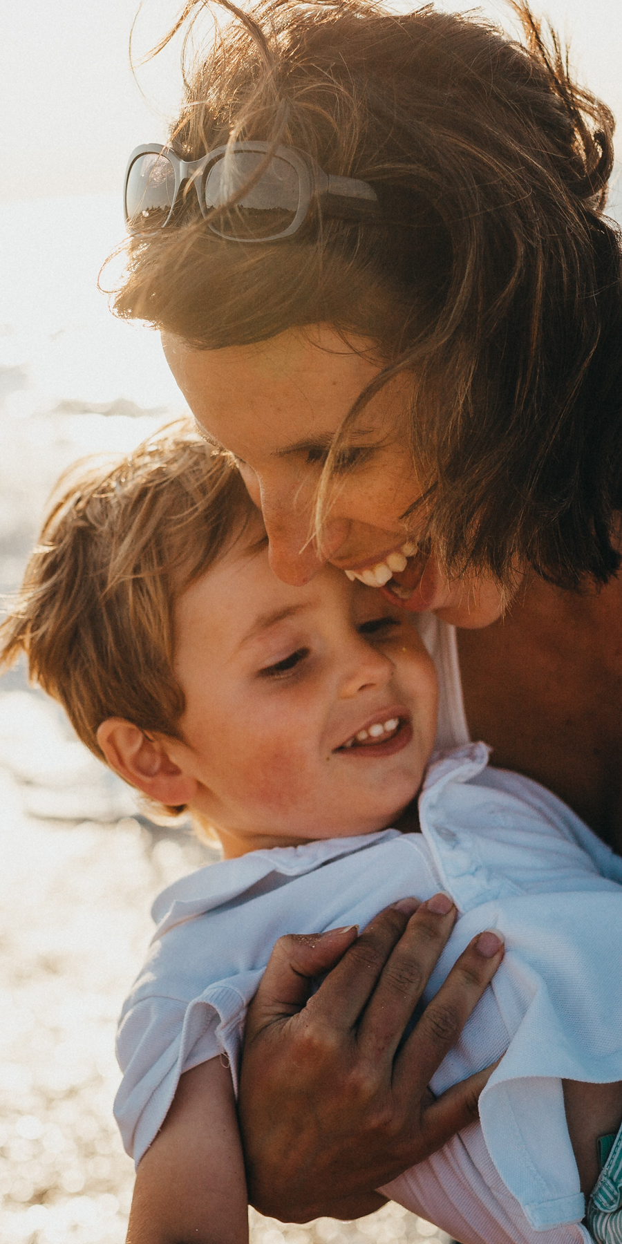 Biologica Spa Alchemy - happy mother and son on a beach